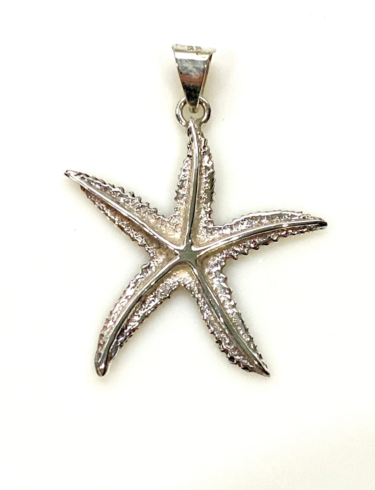 SOLID STERLING SILVER STAR CREATURE PENDANT