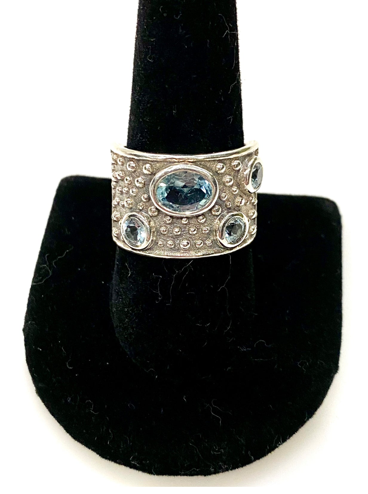 STRIKING BLUE TOPAZ STERLING SILVER BAND